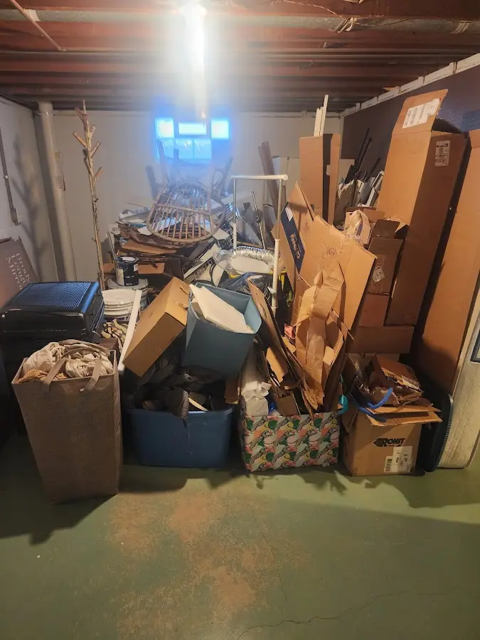 Roll-off dumpster container at job site for Concrete Dumpster Rental in Fairview